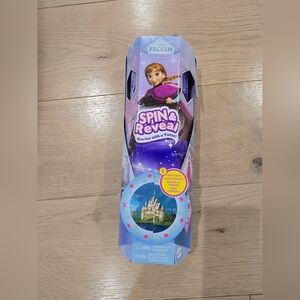 New Spin & Reveal Toy - Anna